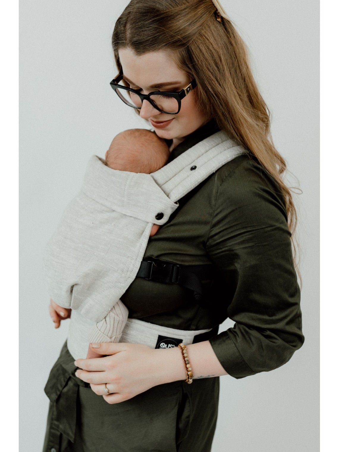 QUSY MINI 2.0 – īpaši viegls un regulējams bērnu slings